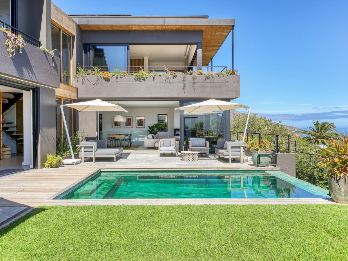A contemporary Camps Bay villa with a rim-flow pool facing the Atlantic