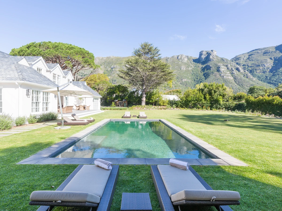 A family villa in Constantia with a pool and garden beneath the mountain