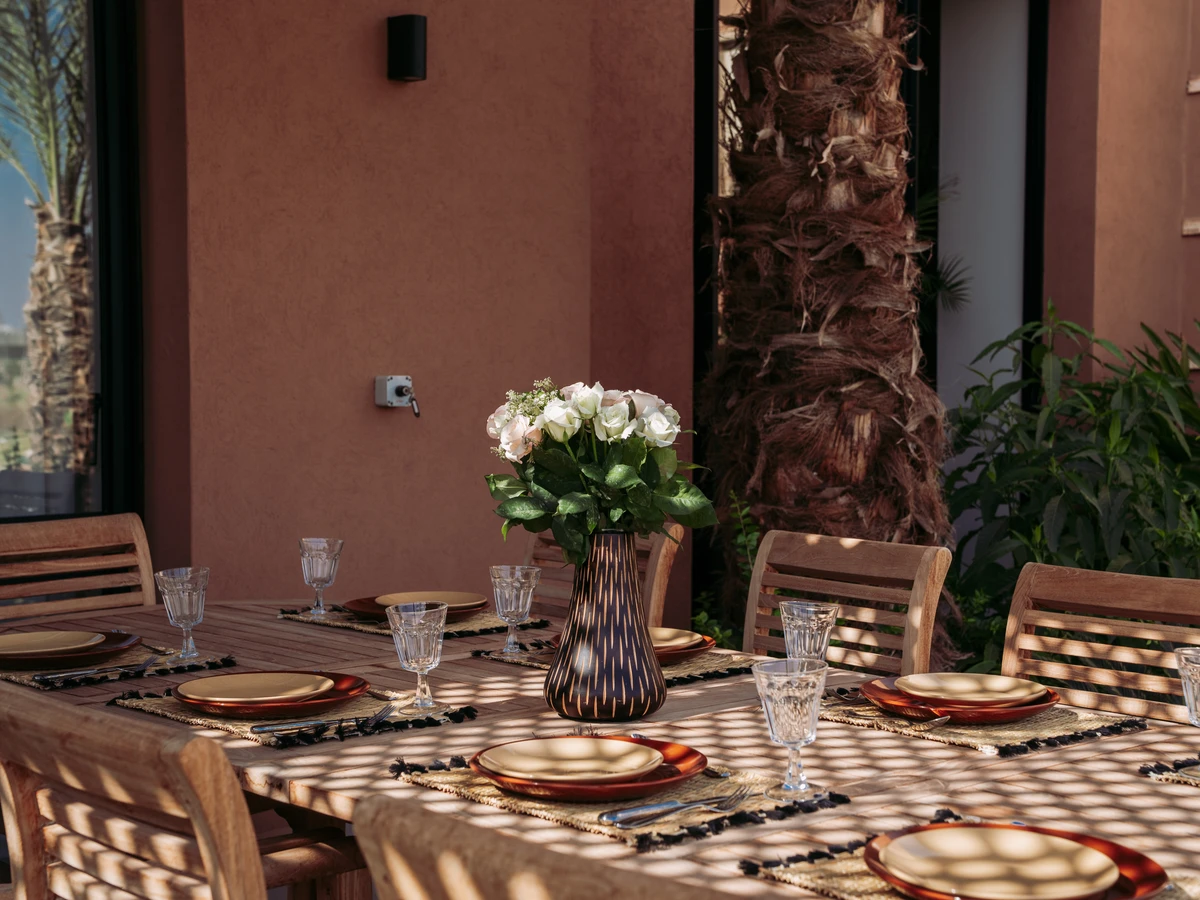Villa 178 garden and outdoor lounge zone with palm-lined pathway, Amelkis Golf Resort, Marrakech