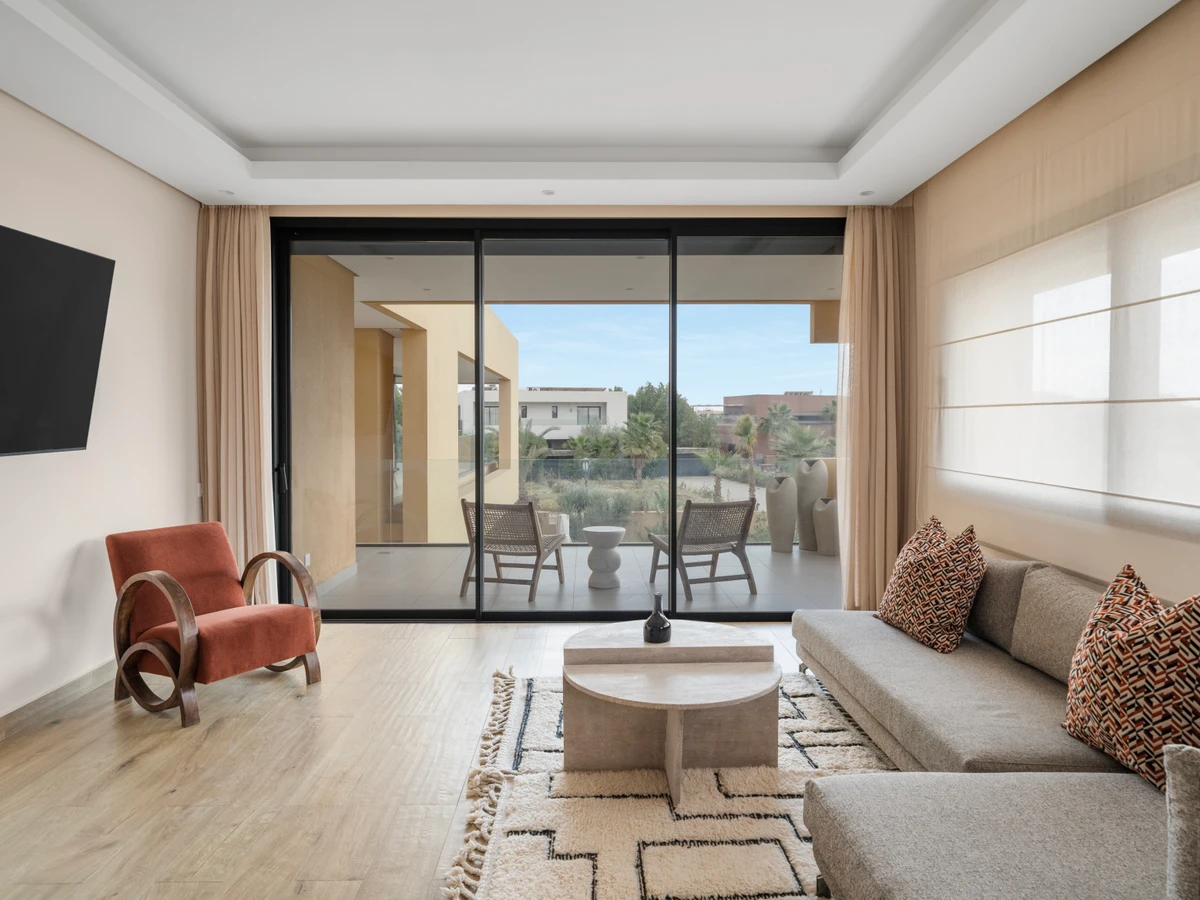 Bedroom at Villa Aurea, Marrakech, with curated artwork and bold color story