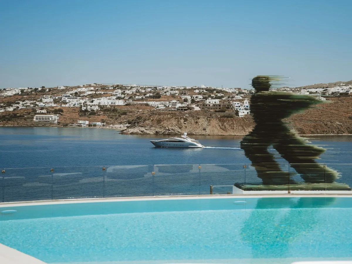 Infinity pool and Aegean sunset at a private Mykonos villa