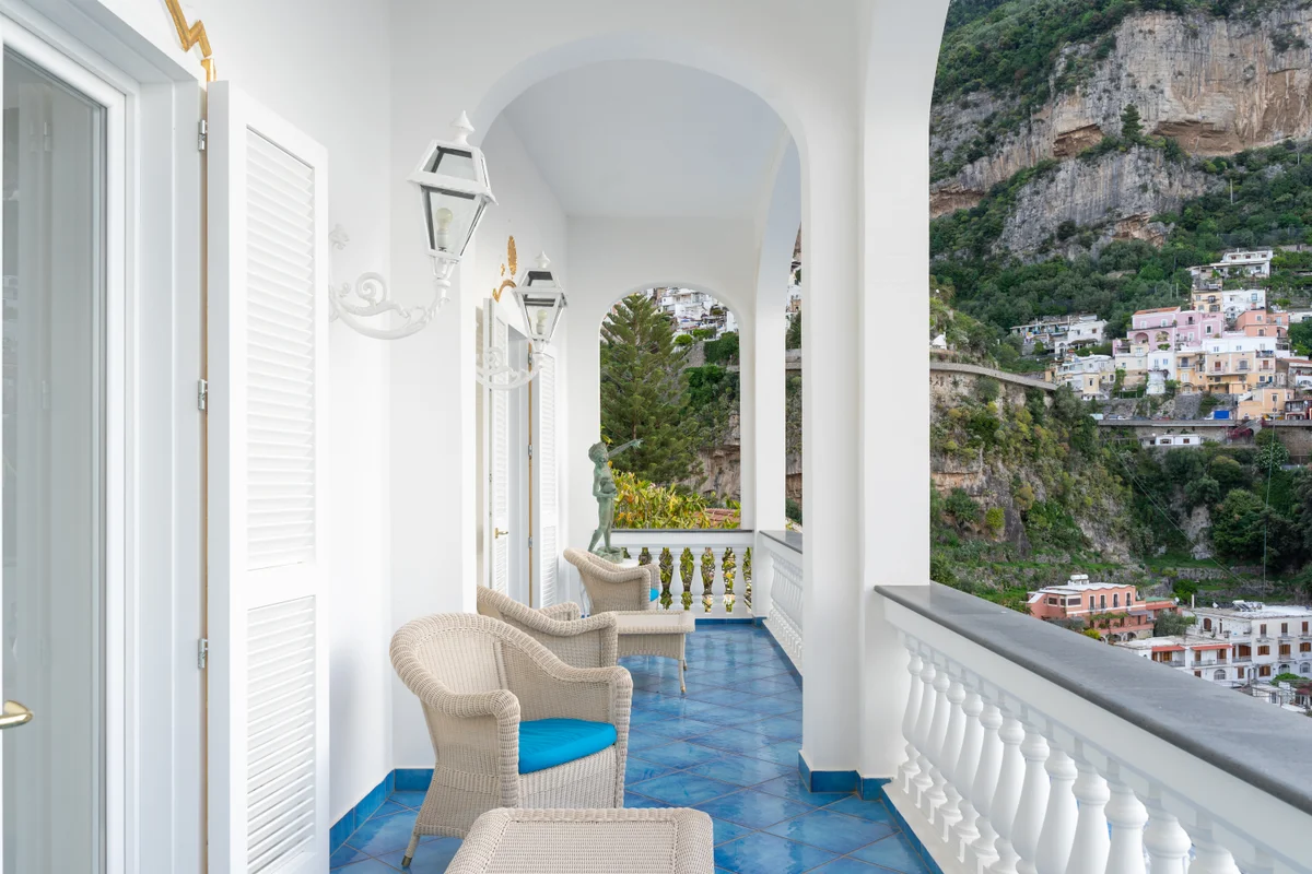 Pergola shaded dining terrace overlooking the Amalfi Coast